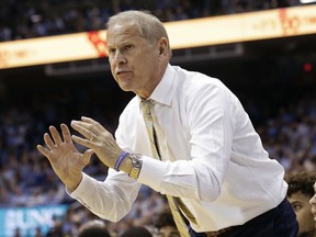 FILE - In this Nov. 29, 2017, file photo, Michigan coach John Beilein gestures during the second half of the team's NCAA college basketball game against North Carolina in Chapel Hill, N.C. A person with knowledge of the situation says Beilein has interviewed for the Detroit Pistons' coaching vacancy. The person spoke on condition of anonymity Friday, June 1, because he was not authorized to speak publicly about the matter.