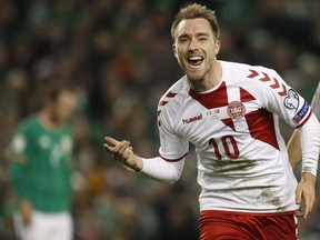 FILE - In this Nov. 14, 2017, file photo, Denmark's Christian Eriksen celebrates after scoring his side's third goal during the World Cup qualifying second leg soccer match against Ireland in Dublin, Ireland. Led by explosive star Tottenham Hotspur midfielder Christian Eriksen, the Danish Dynamite responded with six victories and three ties during their final nine qualifiers. That run included a 4-0 rout of qualifying group-winner Poland and a 5-1 demolition of Ireland in the second leg of a two-game playoff to secure a fifth World Cup appearance and first since 2010.