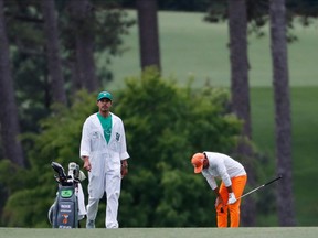 FILE - In this April 8, 2018, file photo, Rickie Fowler reacts to a shot on the 17th hole during the fourth round at the Masters golf tournament in Augusta, Ga. Majors have not been kind to Fowler. In April, he came up one shot short of Patrick Reed at the Masters. Fowler also was runner-up at both the U.S. and British Opens in 2014. In all, he has eight top-five finishes in Grand Slam events.
