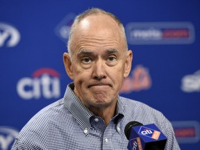 FILE - In this Oct. 6, 2015, file photo,  New York Mets general manager Sandy Alderson reacts to questions from the media during a baseball news conference at Citi Field in New York. Alderson says his players are running out of time to turn around their season and he takes the responsibility as the person in charge of assembling the roster. New York started 11-1 but began Tuesday, June 12, 2018, with a 28-34 record, sitting fourth in the NL East.