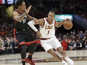 FILE - In this April 3, 2018, file photo, Cleveland Cavaliers' Rodney Hood (1) drives against Toronto Raptors' DeMar DeRozan (10) during the first half of an NBA basketball game, in Cleveland. A person familiar with the decision says the Cavaliers will extend a $3.4 million qualifying offer to restricted free agent forward Rodney Hood. The team plans to make the offer ahead of Friday's, June 29 midnight deadline, said the person who spoke to the Associated Press on condition of anonymity because the team is not discussing publicly discussing its plans ahead of free agency starting.