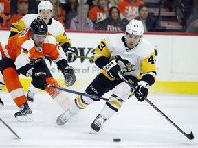 FILE - In this Sunday, April 15, 2018 file photo, Philadelphia Flyers' Ivan Provorov, left, and Pittsburgh Penguins' Conor Sheary, chase the puck during the first period in Game 3 of an NHL first-round hockey playoff series in Philadelphia, The Buffalo Sabres have acquired forward Conor Sheary and defenseman Matt Hunwick in a trade with the Pittsburgh Penguins, Wednesday, June 27, 2018.