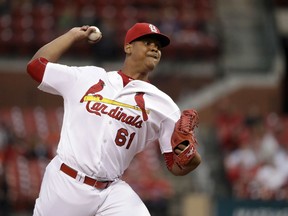 FILE - In this Sept. 29, 2016, file photo, St. Louis Cardinals starting pitcher Alex Reyes throws during the first inning of a baseball game against the Cincinnati Reds in St. Louis. Cardinals right-hander Alex Reyes underwent season-ending surgery Wednesday, June 6, 2018 to repair a tendon attached to the strained latissimus dorsi muscle in the upper right side of his back.