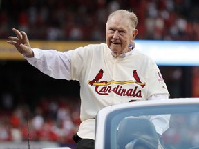FILE - In this May 17, 2017, file photo, Red Schoendienst, manager of the St. Louis Cardinals' 1967 World Series championship team, takes part in a ceremony honoring the 50th anniversary of the victory, before a baseball game between the Cardinals and the Boston Red Sox in St. Louis. Schoendienst, the Hall of Fame second baseman who managed the Cardinals to two pennants and a World Series championship in the 1960s, died Wednesday, June 6, 2018. He was 95. The Cardinals announced Schoendienst's death before the top of the third inning during their game against the Miami Marlins.
