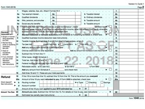 This image shows the back of the draft copy of the new 1040 income tax form. The draft given to The Associated Press by a staffer on the Ways & Means Committee shows that the form will be reduced from two full pages to one double-sided half page. (IRS via AP)