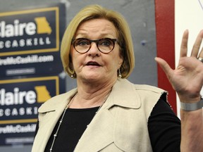 FILE - In this May 18, 2018, file photo, Sen. Claire McCaskill, D-Mo., speaks to supporters at the opening of her campaign field office in Ferguson, Mo. McCaskill remains on the campaign trail with a cracked rib after a fellow senator performed the Heimlich maneuver on her when she began choking.