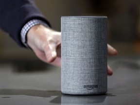 FILE - In this Sept. 27, 2017, file photo, a new Amazon Echo is displayed during a program announcing several new Amazon products by the company, in Seattle. Amazon has launched a version of Alexa for hotels that lets guests order room service through the voice assistant, ask for more towels or get restaurant recommendations without having to pick up the phone and call the front desk. Marriott signed up for the service.