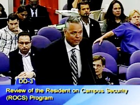 FILE - In this Feb. 18, 2015, file frame from video from Broward County Public Schools, school resource officer Scot Peterson talks during a school board meeting of Broward County, Fla. The former sheriff's deputy who's been called a coward for his actions during a mass shooting at a Florida high school says he's haunted by what happened. Peterson told NBC's "Today Show" in a segment aired Tuesday, June 5, 2018, that "those were my kids in there" and he "would have never let my kids get slaughtered." (Broward County Public Schools via AP, File)