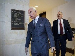FILE - In this Sept. 26, 2017, file photo, longtime Donald Trump associate Roger Stone arrives to testify before the House Intelligence Committee, on Capitol Hill in Washington. Special Counsel Robert Mueller is examining previously undisclosed contact between former Trump campaign officials and a Russian figure alleged to have tried to sell them dirt on Hillary Clinton during the 2016 campaign. But Stone and Michael Caputo say they believe the man was an FBI informant trying to set them up. He denied that to the Washington Post.