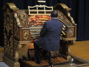 Joe Amato, curator for the Wurlitzer 426 pipe organ at Long Island University Brooklyn Paramount Theatre, plays the organ during a groundbreaking ceremony for the building's renovation, Thursday June 21, 2018, in New York. An original 1920s Wurlitzer organ– one of only two of the model ever built, is expected to remain as part of a new entertainment arts venue. "The university wants the organ not only playable, but restored to its original condition," said Amato. "All involved assured me it will be preserved and protected during construction.