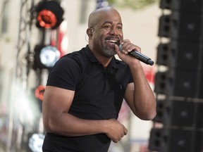 FILE - In this May 25, 2018 file photo, Darius Rucker performs on NBC's Today show at Rockefeller Plaza in New York. Country singers Rucker and Kane Brown are sharing a chart record as the first two solo acts who are also minorities to follow each other with No. 1 country songs in the 28-year history of the Billboard Country Airplay chart.