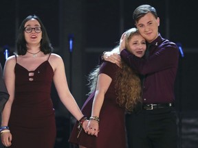 Students from the Marjory Stoneman Douglas High School drama department react after performing "Seasons of Love" at the 72nd annual Tony Awards at Radio City Music Hall on Sunday, June 10, 2018, in New York.