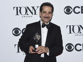 Tony Shalhoub poses in the press room with the award for leading actor in a musical for "The Band's Visit" at the 72nd annual Tony Awards at Radio City Music Hall on Sunday, June 10, 2018, in New York.