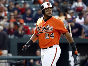 FILE - In this April 21, 2018, file photo, Baltimore Orioles' Pedro Alvarez walks off the field after striking out swinging to end the third inning of a baseball game against the Cleveland Indians in Baltimore. Alvarez, on Tuesday, June 19, 2018, has been designated for assignment by the Orioles, who are shuffling the roster in an attempt to improve upon the worst record in the big leagues. The 31-year-old Alvarez had a .181 batting average with eight home runs and 18 RBIs in 45 games. He was in a 1-for-18 skid since his last multi-hit game, on May 24.