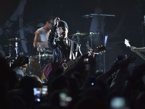 Guitarist The Edge of U2 performs during an Apollo Theater concert hosted by SiriusXM on Monday, June 11, 2018, in New York.