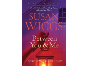 This cover image released by William Morrow shows "Between You & Me," a novel by Susan Wiggs. (William Morrow via AP)