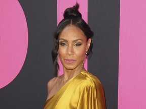 FILE - In this July 13, 2017 file photo, Jada Pinkett Smith arrives at the world premiere of "Girls Trip" in Los Angeles. Pinkett Smith hosts a multi-generational Facebook show Red Table Talk.