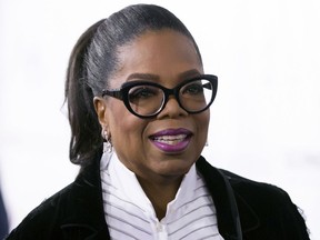 FILE - In this Oct. 21, 2017 file photo, Oprah Winfrey arrives for the David Foster Foundation 30th Anniversary Miracle Gala and Concert, in Vancouver, British Columbia. Winfrey's next book club pick is,,"The Sun Does Shine: How I Found Life and Freedom on Death Row," a memoir about a wrongful murder conviction and the long fight to win acquittal.