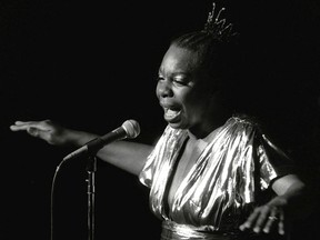 FILE - In this June 27, 1985, file photo, Nina Simone performs at Avery Fisher Hall in New York. The dilapidated wooden cottage in North Carolina that was the birthplace of singer and civil rights activist Nina Simone now has the protection of the National Trust for Historic Preservation. The trust said in a news release Tuesday, June 19, 2018, that it will develop and find a new use for the house in Tryon where Simone was born in 1933.