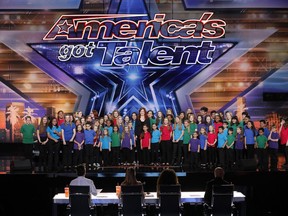 In this image released by NBC, the Voices of Hope Children's Choir appear on stage during "America's Got Talent," in Pasadena, Calif. The talent competition series dominated the ratings last week.