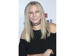 FILE - In this Sept. 12, 2017 file photo, Barbra Streisand attends the Hand in Hand: A Benefit for Hurricane Harvey Relief in Universal City, Calif.  Streisand is giving an early thumbs-up to the remake of "A Star Is Born" with Lady Gaga and Bradley Cooper. Streisand and Kris Kristofferson topped the 1976 version of the romantic drama about a rising performer and a fading star.