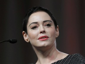 FILE- In this Oct. 27, 2017, file photo, actress Rose McGowan speaks at the inaugural Women's Convention in Detroit. A grand jury in Virginia has indicted the actress on one felony count of cocaine possession. McGowan's trial date will be set Tuesday.