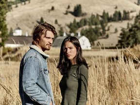 This image released by Paramount Network shows Luke Grimes, left, and Kelsey Asbille from the series "Yellowstone" premiering Wednesday, June 20.
