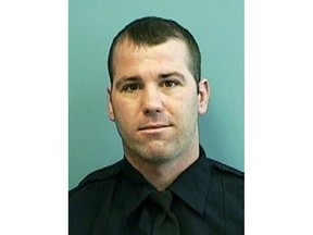 FILE - This undated file photo provided by the Baltimore Police Department shows Detective Daniel Hersl.  The veteran police officer who was a member of a deeply corrupt Baltimore squad faces sentencing Friday, June 22, 2018, a few months after a jury found him guilty of racketeering and robbery.