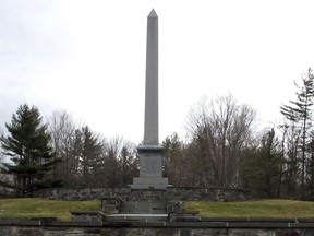 In this March 29, 2016, file photo, an obelisk marks the birthplace of Mormonism founder Joseph Smith in Sharon, Vt. A Utah businessman is abandoning plans for a massive development in four rural Vermont towns based on the papers of Mormon founder Joseph Smith after fierce opposition to the project.