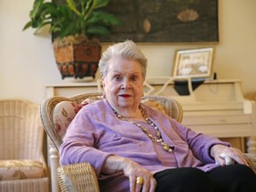 In this Nov. 17, 2015, file photo, Ella Brennan poses for a photo during an interview in her home, adjacent to Commander's Palace Restaurant in New Orleans. Brennan, who couldn't cook but played a major role in putting New Orleans on the world's culinary map, died Thursday, May 31. 2018. She was 92.