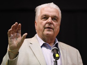 FILE - In this May 8, 2018 file photo, Clark County Commission member Steve Sisolak speaks during a forum for Nevada gubernatorial candidates in Las Vegas. The fiercest primary election battle in Nevada this year is a race between two Democrats vying to become the swing state's first Democratic governor in almost two decades. The fight between Sisolak and Christina Giunchigliani has seen them spar over their response to the October mass shooting in Las Vegas while pledging to resist President Donald Trump and the National Rifle Association.