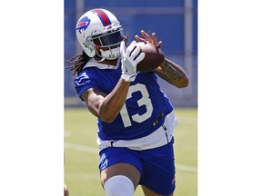 Buffalo Bills receiver Kelvin Benjamin (13) makes a catch during the team's NFL football minicamp in Orchard Park, N.Y., Thursday, June 14, 2018.