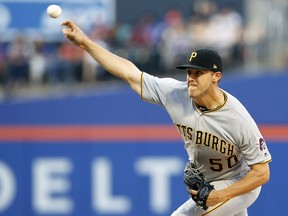 Pittsburgh Pirates pitcher Jameson Taillon delivers a pitch during the first inning of a baseball game against the New York Mets on Monday, June 25, 2018, in New York.