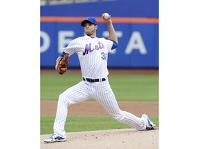 New York Mets' Steven Matz (32) delivers a pitch during the first inning of a baseball game against the Chicago Cubs Sunday, June 3, 2018, in New York.