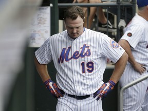 New York Mets' Jay Bruce returns to the dugout after flying out during the ninth inning of a baseball game against the Baltimore Orioles at Citi Field, Wednesday, June 6, 2018, in New York. The Orioles defeated the Mets 1-0.