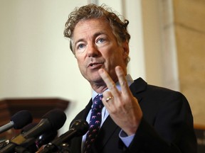 FILE - In this Sept. 25, 2017, file photo, Sen. Rand Paul, R-Ky., speaks during a news conference on Capitol Hill in Washington. Paul is suing his neighbor who admitted to tackling Rand as he mowed his yard. The Bowling Green Daily News reports the Friday, June 22, 2018, complaint seeks compensatory and punitive damages from neighbor Rene Boucher for "physical pain and mental suffering" from the November assault.