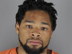 This booking photo provided by the Hennepin County Sheriff's Office, in Minneapolis, shows Kabaar Powell. On Wednesday, June 13, 2018, prosecutors said Powell, an unlicensed driver who was being chased by state troopers, didn't slow down when he plowed through a basketball court, running over two children. Powell faces multiple charges. (Hennepin County Sheriff's Office via AP)