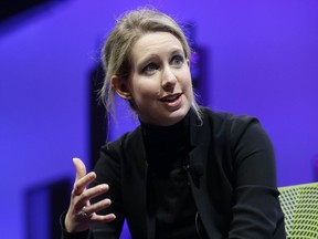 FILE - In this Nov. 2, 2015, file photo, Elizabeth Holmes, founder and CEO of Theranos, speaks at the Fortune Global Forum in San Francisco. Federal prosecutors said Friday, June 15, 2018, they have indicted Holmes on criminal fraud charges for allegedly defrauding investors, doctors and patients as the head of the once-heralded blood-testing startup Theranos.