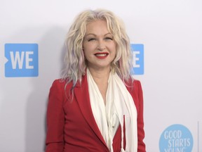 FILE - In a Thursday, April 19, 2018 file photo, Cyndi Lauper arrives at WE Day California at The Forum, in Inglewood, Calif. Lauper is spearheading research into how state governments deal with youth homelessness -- especially for LGBTQ youth. Lauper's True Colors Fund released a report Thursday, June 28, 2018, measuring how each state holds up on providing services such as housing and mental health for homeless youth. It finds that even the states with the best rankings -- Washington, Massachusetts, California and Connecticut -- scored less than 70 on a scale of 100 points.