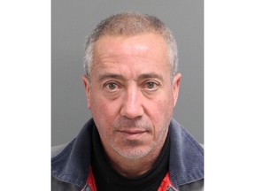 FILE - This undated file mug shot provided by the Wake City-County Bureau of Identification shows Christian Desgroux, 57, who's accused of pretending to be a U.S. Army general when he landed a chartered helicopter at a technology company in North Carolina in November 2017. Desgroux pleaded guilty Tuesday, June 26, 2018 to one count of pretending to be a military officer. The 58-year-old faces up to three years in prison at his sentencing scheduled for late July. (Wake City-County Bureau of Identification via AP, File)
