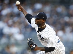 New York Yankees pitcher Domingo German throws during the first inning of the team's baseball game against the Tampa Bay Rays on Thursday, June 14, 2018, in New York.