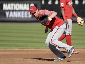 Washington Nationals second baseman Daniel Murphy fields ground balls before a baseball game against the New York Yankees Tuesday, June 12, 2018, at Yankee Stadium in New York.