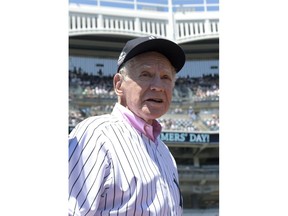 New York Yankees' Whitey Ford looks on as he is introduced at the Yankees Old Timers' Day baseball game Sunday, June 17, 2018, at Yankee Stadium in New York.