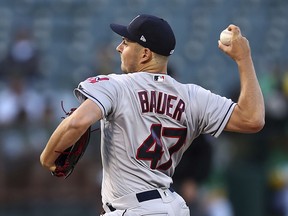 Cleveland Indians pitcher Trevor Bauer works against the Oakland Athletics during the first inning of a baseball game Friday, June 29, 2018, in Oakland, Calif.