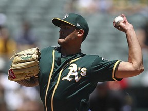 Oakland Athletics pitcher Sean Manaea works against the Kansas City Royals in the first inning of a baseball game Sunday, June 10, 2018, in Oakland, Calif.