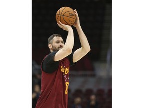 Cleveland Cavaliers center Kevin Love works on his shot following practice Tuesday, June 5, 2018 at Quicken Loans Arena in Cleveland, Ohio.  LeBron James and the Cavaliers have spent this strange season in one predicament after the next. And while they've successfully overcome all types of adversity, a 2-0 deficit in the NBA Finals against the Golden State Warriors represents their biggest challenge yet.