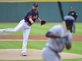 Cleveland Indians starting pitcher Carlos Carrasco delivers to Milwaukee Brewers' Jonathan Cain in the first inning of a baseball game, Wednesday, June 6, 2018, in Cleveland.