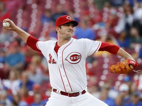 Cincinnati Reds starting pitcher Matt Harvey throws during the first inning of the team's baseball game against the Chicago Cubs, Thursday, June 21, 2018, in Cincinnati.