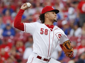 Cincinnati Reds starting pitcher Luis Castillo throws during the first inning of the team's baseball game against the Chicago Cubs, Friday, June 22, 2018, in Cincinnati.