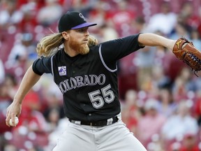 Colorado Rockies starting pitcher Jon Gray throws during the first inning of the team's baseball game against the Cincinnati Reds, Wednesday, June 6, 2018, in Cincinnati.